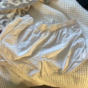 White Nike shorts- size M. Perfect condition! Barely worn.